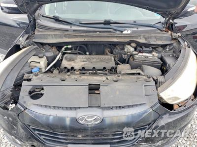 Zdjęcie 12 z 13 samochodu: 2012 HYUNDAI TUCSON GLS VIN:KM8JU3ACXCU459872 - miniatura