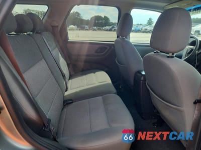Zdjęcie 11 z 13 samochodu: 2006 FORD ESCAPE XLT VIN:1FMYU03116KA86827 - miniatura