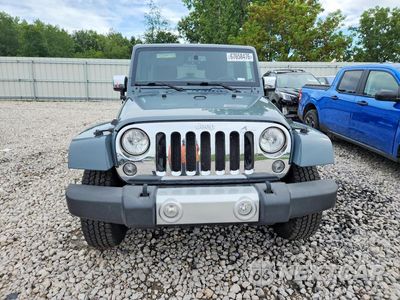 Piąte zdjęcie samochodu w środku: 2015 JEEP WRANGLER UNLIMITED SAHARA VIN:1C4BJWEGXFL561781 - miniatura
