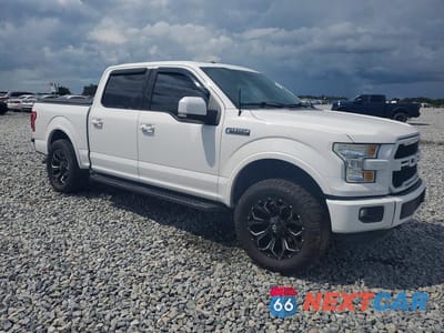 Czwarte zdjęcie samochodu z boku: 2015 FORD F150 SUPERCREW VIN:1FTEW1EF8FFC89416 - miniatura