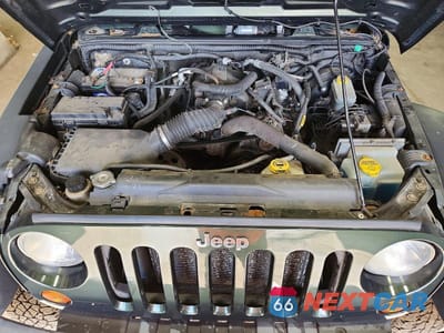 Zdjęcie 12 z 13 samochodu: 2010 JEEP WRANGLER SPORT VIN:1J4AA2D16AL202478 - miniatura