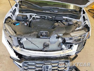 Zdjęcie 12 z 13 samochodu: 2023 HONDA PASSPORT TRAIL SPORT VIN:5FNYF8H68PB007864 - miniatura