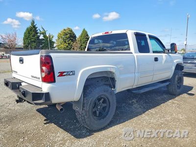 Trzecie zdjęcie samochodu z tyłu: 2004 CHEVROLET SILVERADO K1500 VIN:1GCEK19T44Z274161 - miniatura
