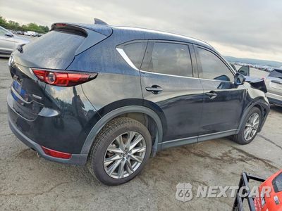 Trzecie zdjęcie samochodu z tyłu: 2021 MAZDA CX-5 GRAND TOURING VIN:JM3KFBDMXM1480300 - miniatura