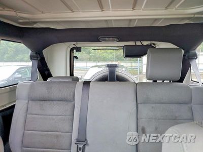 Zdjęcie 10 z 13 samochodu: 2007 JEEP WRANGLER SAHARA VIN:1J4GA59157L106127 - miniatura