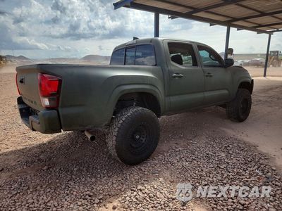 Trzecie zdjęcie samochodu z tyłu: 2022 TOYOTA TACOMA SR VIN:3TYAX5GN2NT048039 - miniatura