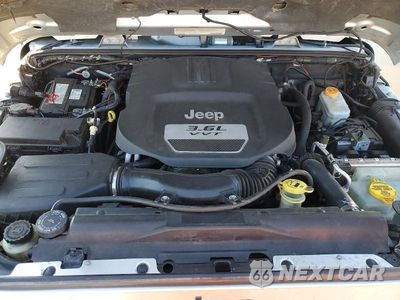 Zdjęcie 12 z 14 samochodu: 2012 JEEP WRANGLER UNLIMITED RUBICON VIN:1C4HJWFG5CL211172 - miniatura