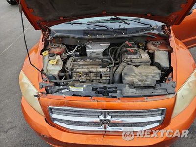 Zdjęcie 11 z 12 samochodu: 2011 DODGE CALIBER MAINSTREET VIN:1B3CB3HA0BD220922 - miniatura
