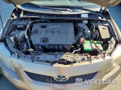 Zdjęcie 11 z 12 samochodu: 2009 TOYOTA COROLLA LE VIN:1NXBU40EX9Z010827 - miniatura