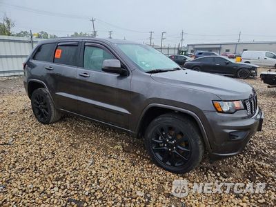 Czwarte zdjęcie samochodu z boku: 2019 JEEP GRAND CHEROKEE LAREDO VIN:1C4RJFAG5KC729096 - miniatura