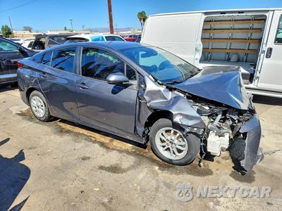 Czwarte zdjęcie samochodu z boku: 2021 TOYOTA PRIUS L ECO VIN:JTDKAMFU4M3127197 - miniatura