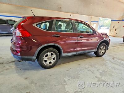 Trzecie zdjęcie samochodu z tyłu: 2015 HONDA CR-V LX VIN:2HKRM4H3XFH604765 - miniatura