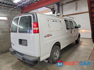 Trzecie zdjęcie samochodu z tyłu: 2014 CHEVROLET EXPRESS G2500 VIN:1GCZGUCA6E1185672 - miniatura