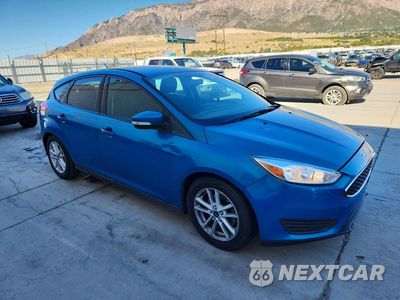 Czwarte zdjęcie samochodu z boku: 2016 FORD FOCUS VIN:1FADP3K22GL362777 - miniatura
