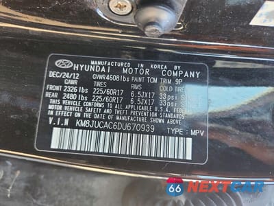 Zdjęcie 13 z 13 samochodu: 2013 HYUNDAI TUCSON GLS VIN:KM8JUCAC6DU670939 - miniatura