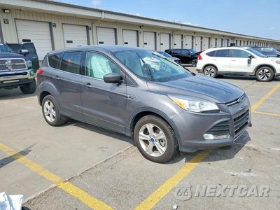 Czwarte zdjęcie samochodu z boku: 2014 FORD ESCAPE SE VIN:1FMCU0G91EUA12112 - miniatura