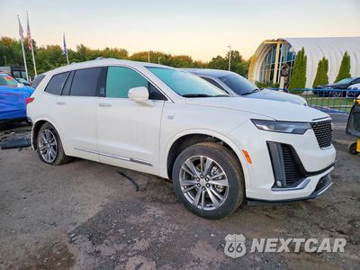 Czwarte zdjęcie samochodu z boku: 2022 CADILLAC XT6 PREMIUM LUXURY VIN:1GYKPDRS2NZ162564 - miniatura