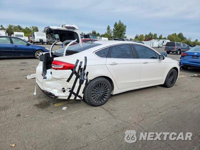 Trzecie zdjęcie samochodu z tyłu: 2017 FORD FUSION TITANIUM VIN:3FA6P0D99HR319025 - miniatura
