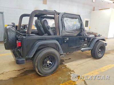 Trzecie zdjęcie samochodu z tyłu: 2003 JEEP WRANGLER / TJ SE VIN:1J4FA29133P343910 - miniatura