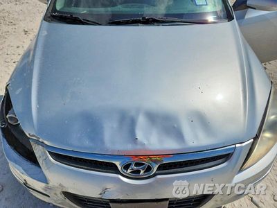 Zdjęcie 11 z 12 samochodu: 2010 HYUNDAI ELANTRA TOURING GLS VIN:KMHDC8AE8AU064679 - miniatura