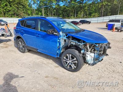 Czwarte zdjęcie samochodu z boku: 2017 TOYOTA RAV4 LE VIN:JTMZFREV8HJ702801 - miniatura