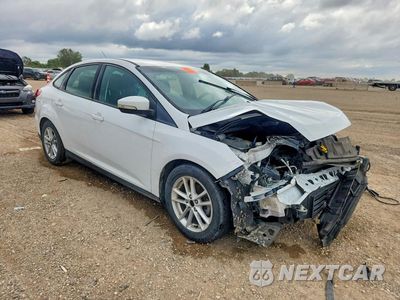 Czwarte zdjęcie samochodu z boku: 2017 FORD FOCUS SE VIN:1FADP3F24HL300373 - miniatura