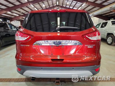 Zdjęcie 6 z 13 samochodu: 2014 FORD ESCAPE TITANIUM VIN:1FMCU9JX1EUB52026 - miniatura