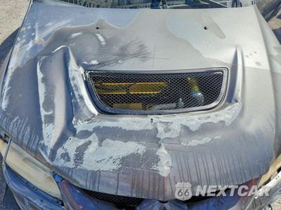 Zdjęcie 11 z 13 samochodu: 2003 MITSUBISHI LANCER EVOLUTION VIN:JA3AH86F03U125065 - miniatura