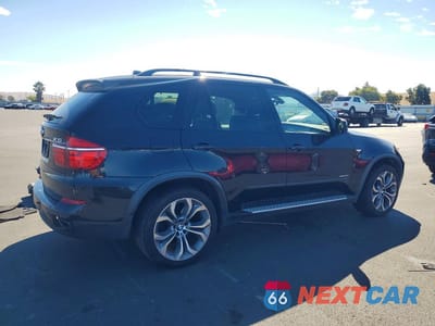 Trzecie zdjęcie samochodu z tyłu: 2012 BMW X5 XDRIVE50I VIN:5UXZV8C5XCL425645 - miniatura