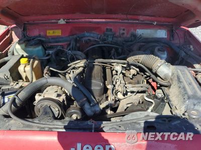Zdjęcie 11 z 12 samochodu: 1993 JEEP CHEROKEE SPORT VIN:1J4FJ68S9PL553247 - miniatura
