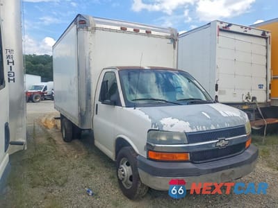 Czwarte zdjęcie samochodu z boku: 2006 CHEVROLET EXPRESS G3500 VIN:1GBJG31U861131607 - miniatura