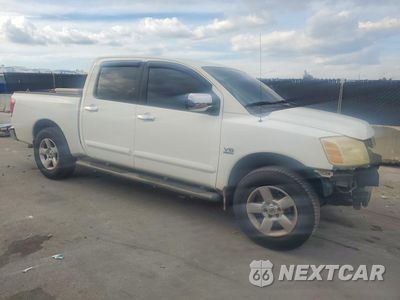 Czwarte zdjęcie samochodu z boku: 2004 NISSAN TITAN XE VIN:1N6AA07A44N578396 - miniatura