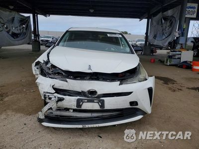 Piąte zdjęcie samochodu w środku: 2021 TOYOTA PRIUS LE VIN:JTDKAMFU0M3148080 - miniatura