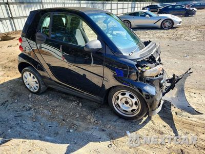 Czwarte zdjęcie samochodu z boku: 2014 SMART FORTWO PURE VIN:WMEEJ3BA4EK780740 - miniatura