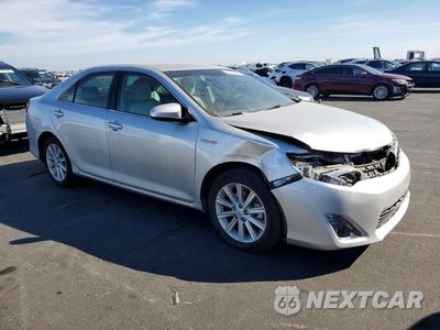 Czwarte zdjęcie samochodu z boku: 2013 TOYOTA CAMRY HYBRID XLE VIN:4T1BD1FK7DU090169 - miniatura