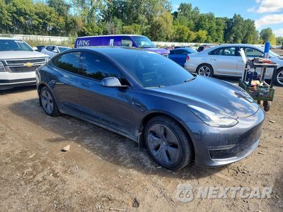 Czwarte zdjęcie samochodu z boku: 2019 TESLA MODEL 3 VIN:5YJ3E1EB0KF510349 - miniatura