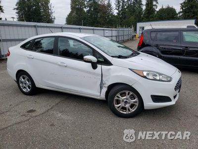 Czwarte zdjęcie samochodu z boku: 2015 FORD FIESTA SE VIN:3FADP4BJ9FM129490 - miniatura