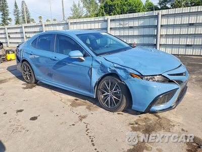 Czwarte zdjęcie samochodu z boku: 2024 TOYOTA CAMRY SE VIN:4T1G11AK1RU218399 - miniatura