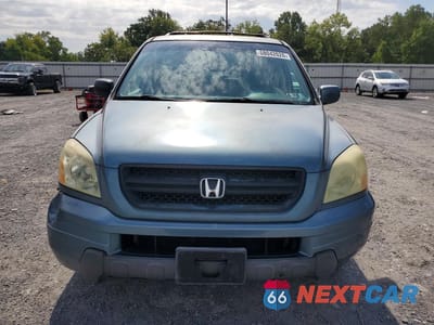 Piąte zdjęcie samochodu w środku: 2005 HONDA PILOT EX VIN:2HKYF18475H517126 - miniatura