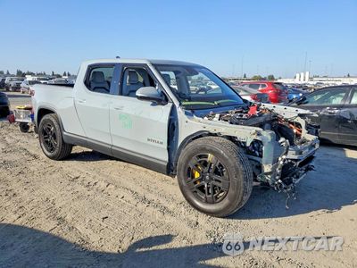 Czwarte zdjęcie samochodu z boku: 2023 RIVIAN R1T ADVENTURE VIN:7FCTGAAA8PN019456 - miniatura