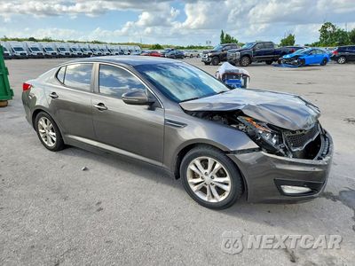 Czwarte zdjęcie samochodu z boku: 2012 KIA OPTIMA LX VIN:5XXGM4A7XCG063860 - miniatura