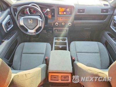 Zdjęcie 8 z 12 samochodu: 2006 HONDA RIDGELINE RT VIN:2HJYK16266H538259 - miniatura