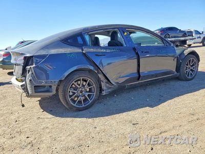 Trzecie zdjęcie samochodu z tyłu: 2021 TESLA MODEL 3 VIN:5YJ3E1EA2MF100436 - miniatura