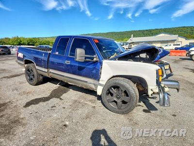 Czwarte zdjęcie samochodu z boku: 1999 GMC SIERRA K1500 VIN:1GTEK19R3XR507410 - miniatura