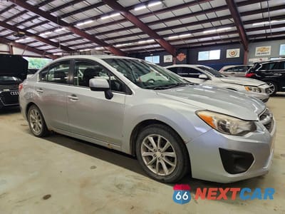 Czwarte zdjęcie samochodu z boku: 2012 SUBARU IMPREZA PREMIUM VIN:JF1GJAC62CH012003 - miniatura
