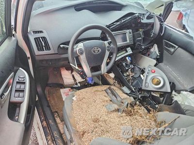 Zdjęcie 8 z 12 samochodu: 2013 TOYOTA PRIUS TWO VIN:JTDKN3DU1D1635480 - miniatura
