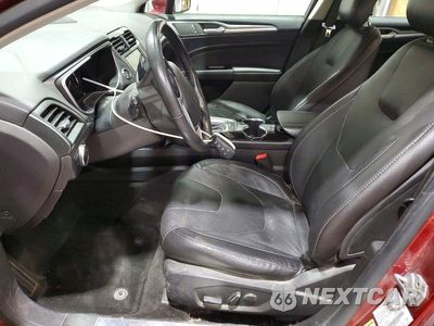 Zdjęcie 7 z 12 samochodu: 2014 FORD FUSION TITANIUM VIN:3FA6P0D94ER292764 - miniatura