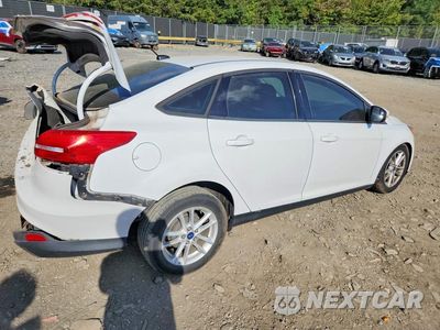Trzecie zdjęcie samochodu z tyłu: 2015 FORD FOCUS SE VIN:1FADP3F24FL328901 - miniatura