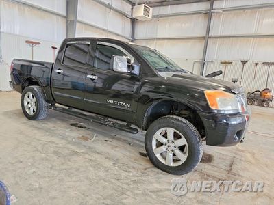 Czwarte zdjęcie samochodu z boku: 2009 NISSAN TITAN XE FFV VIN:1N6BA07C09N310393 - miniatura