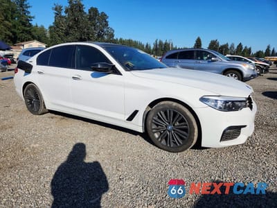 Czwarte zdjęcie samochodu z boku: 2018 BMW 530XE VIN:WBAJB1C58JB084616 - miniatura